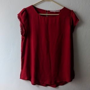 Red flowy blouse